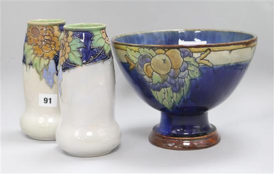 A Royal Doulton pedestal bowl and a pair of vases